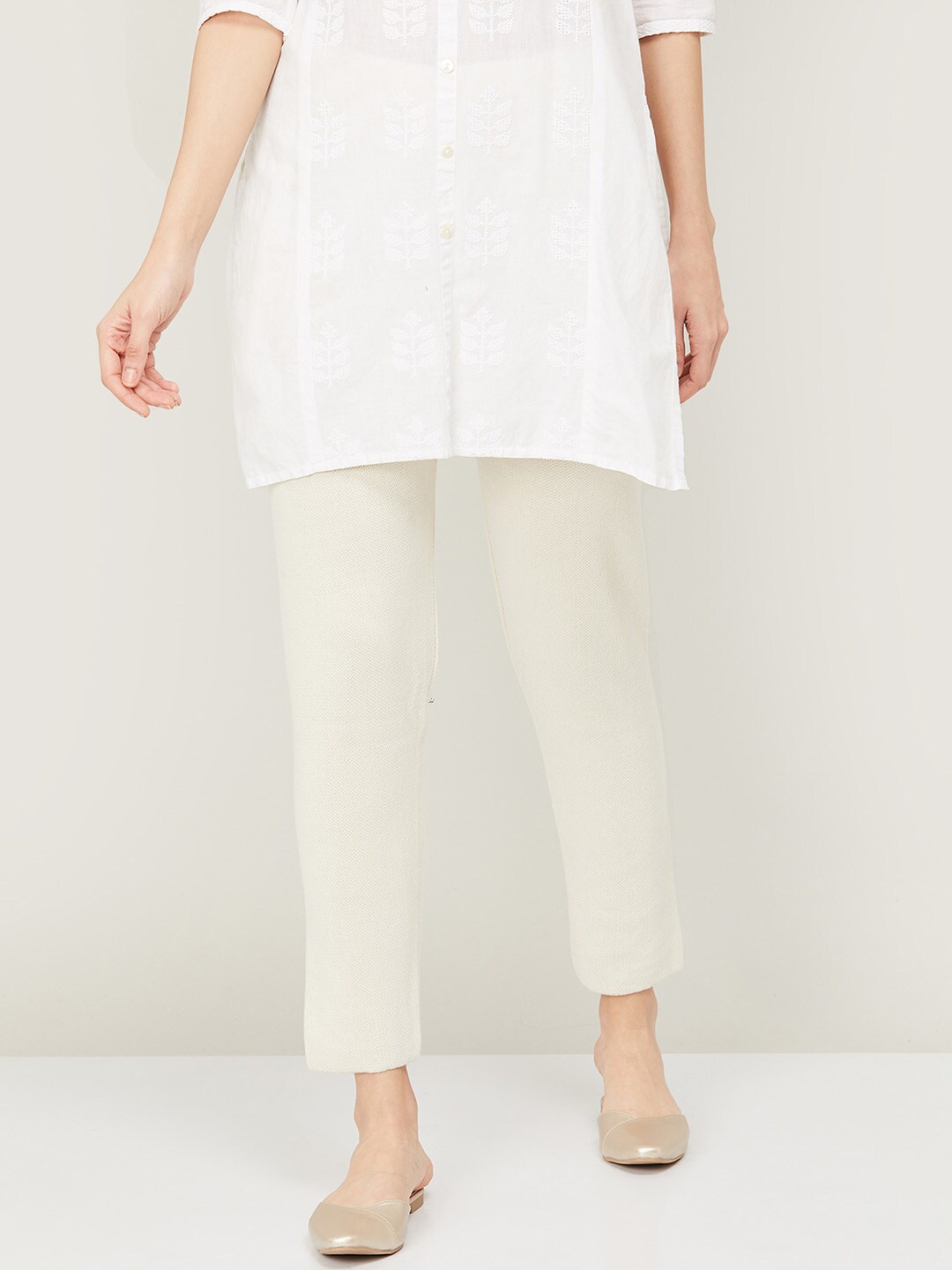 

Melange by Lifestyle Women Off White Solid Acrylic Slim Fit Trousers