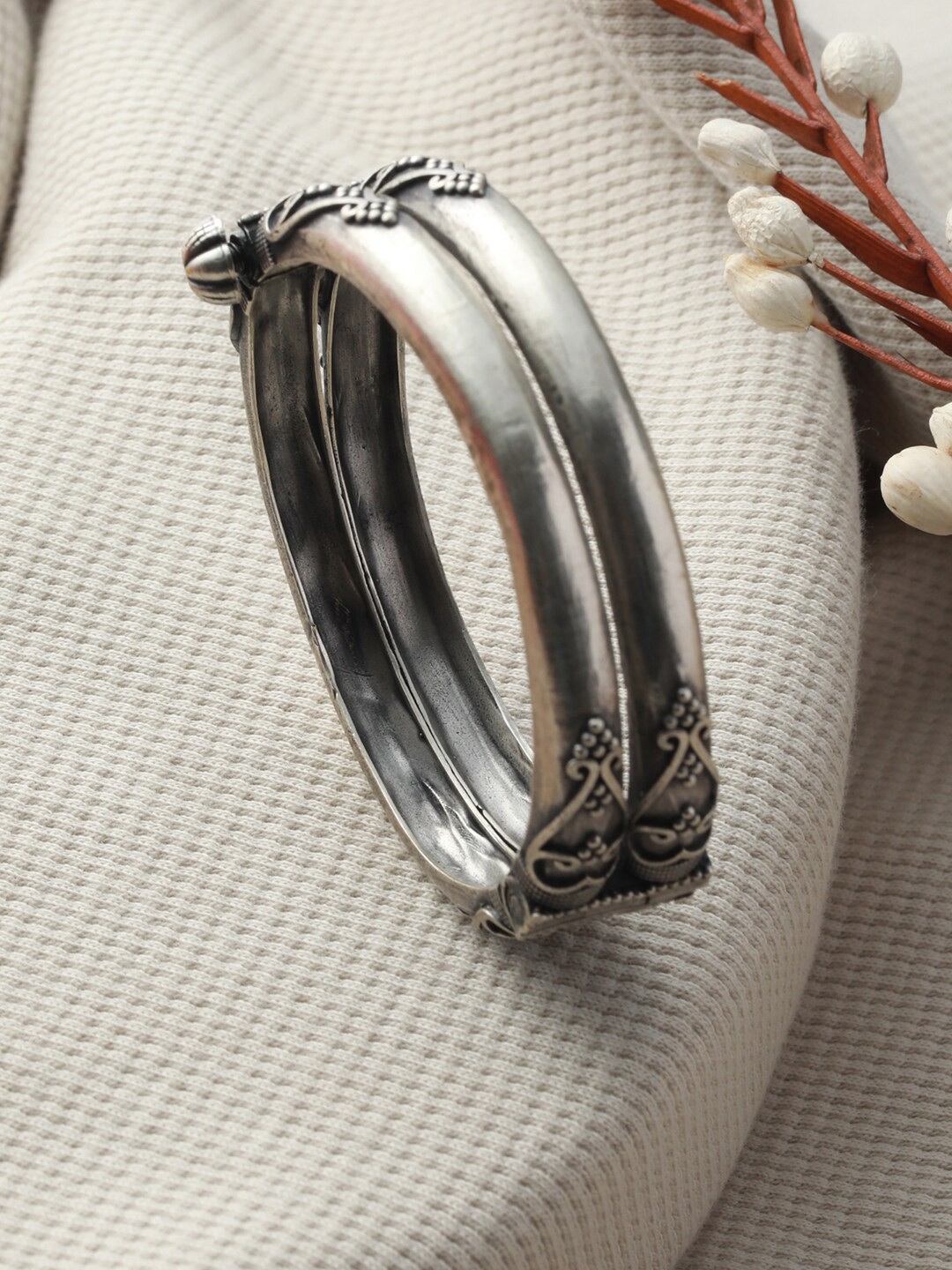 

Priyaasi Women Silver-Toned German Silver-Plated Bangle-Style Bracelet
