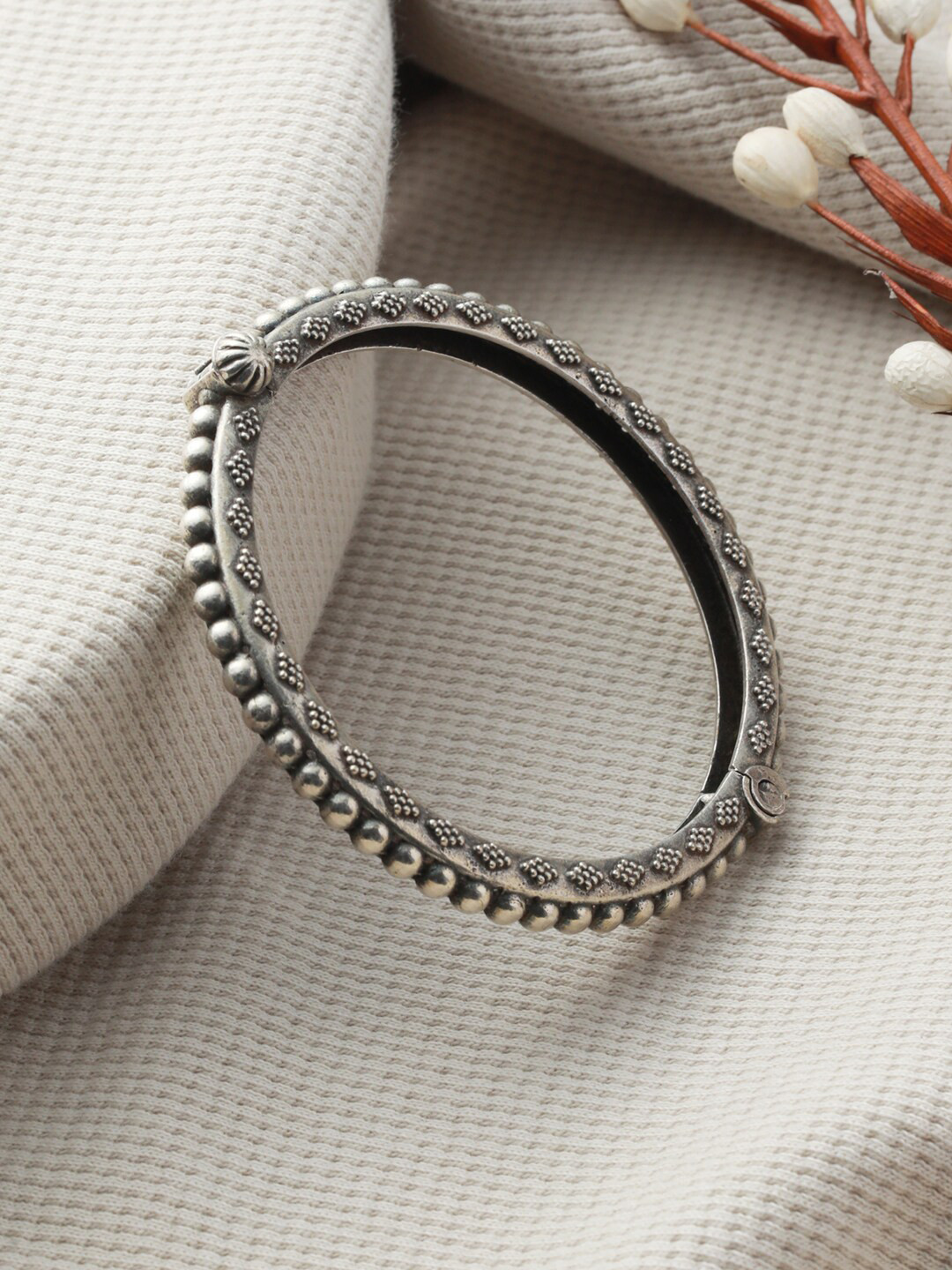 

Priyaasi Women Silver-Toned German Silver-Plated Bangle-Style Bracelet