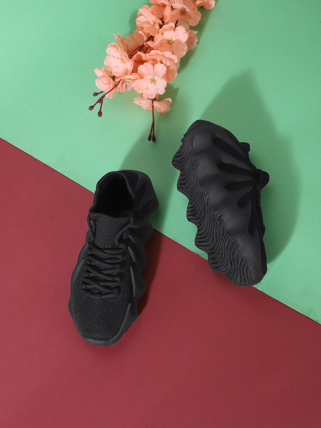 

Truffle Collection Women Black Mesh Sneakers