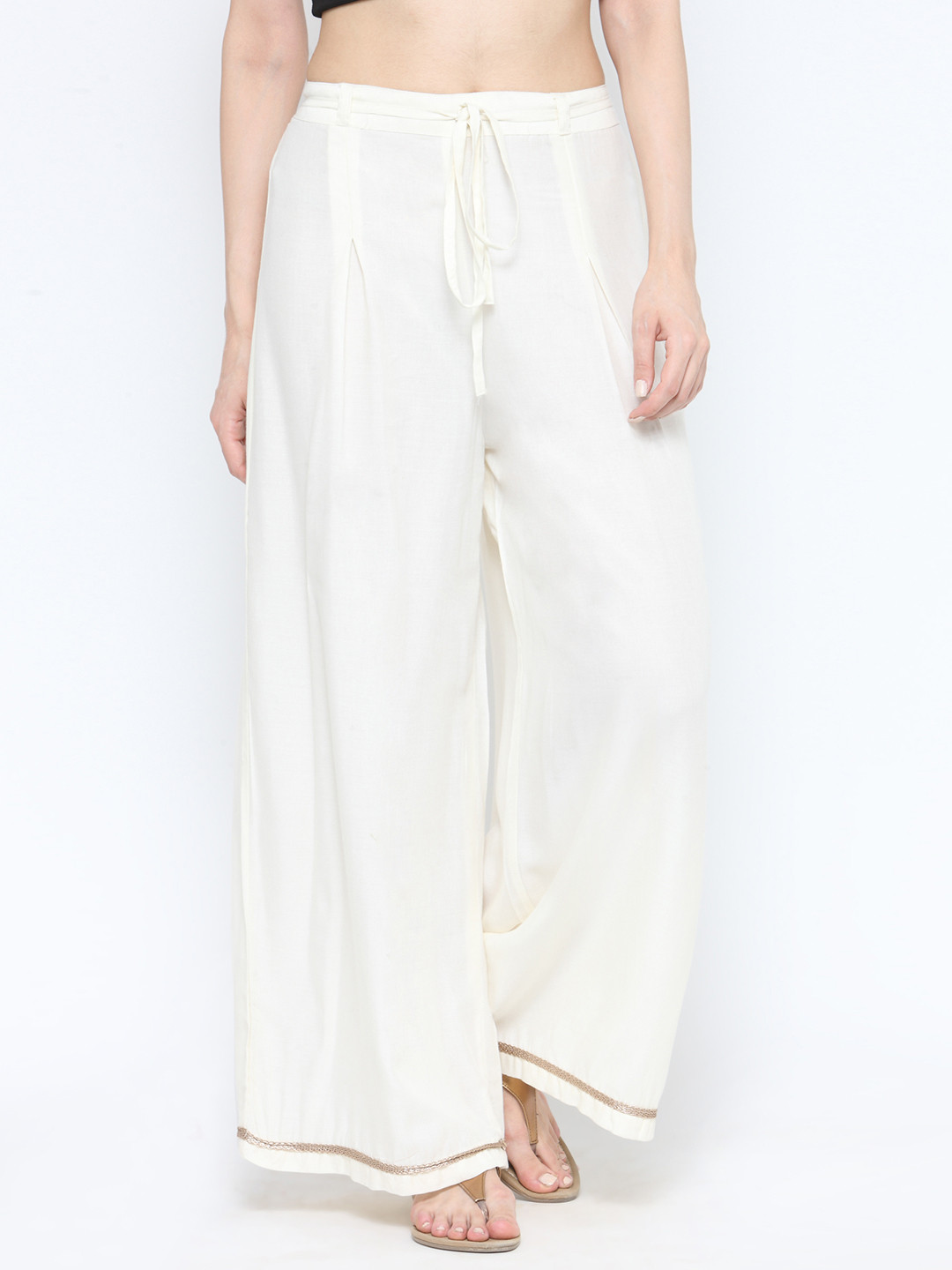 

Tulsattva Women Off-White Wide Leg Solid Palazzos