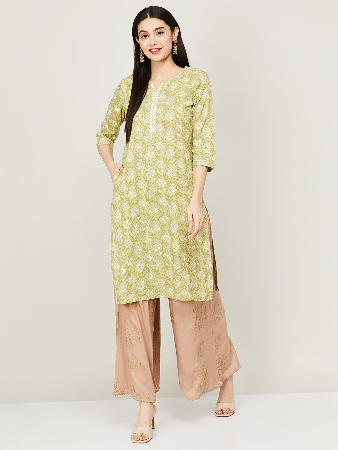 

Melange by Lifestyle Green & White Ethnic Motifs Printed Mirror Work Kurta