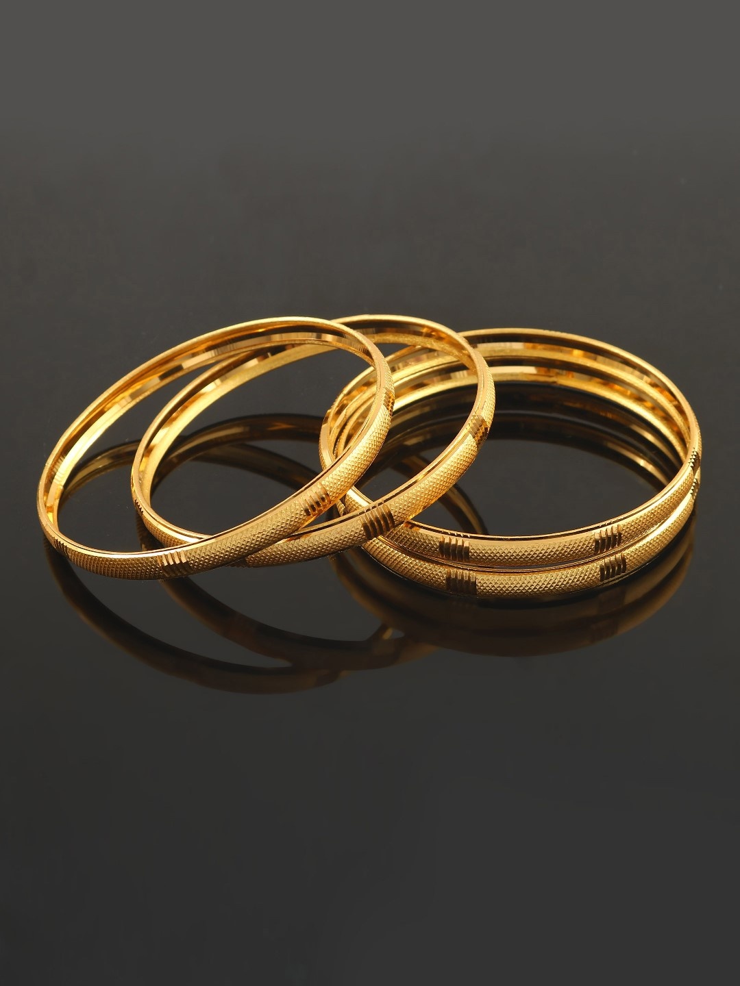 

Jewar Mandi Set Of 4 Gold-Plated Bangles