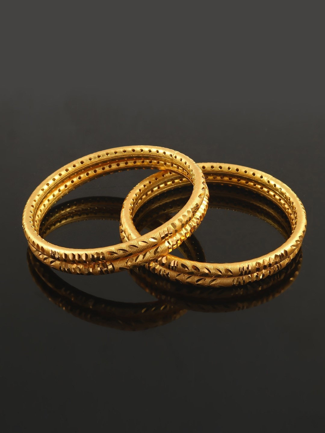 

Jewar Mandi Set Of 4 Gold-Plated Bangles