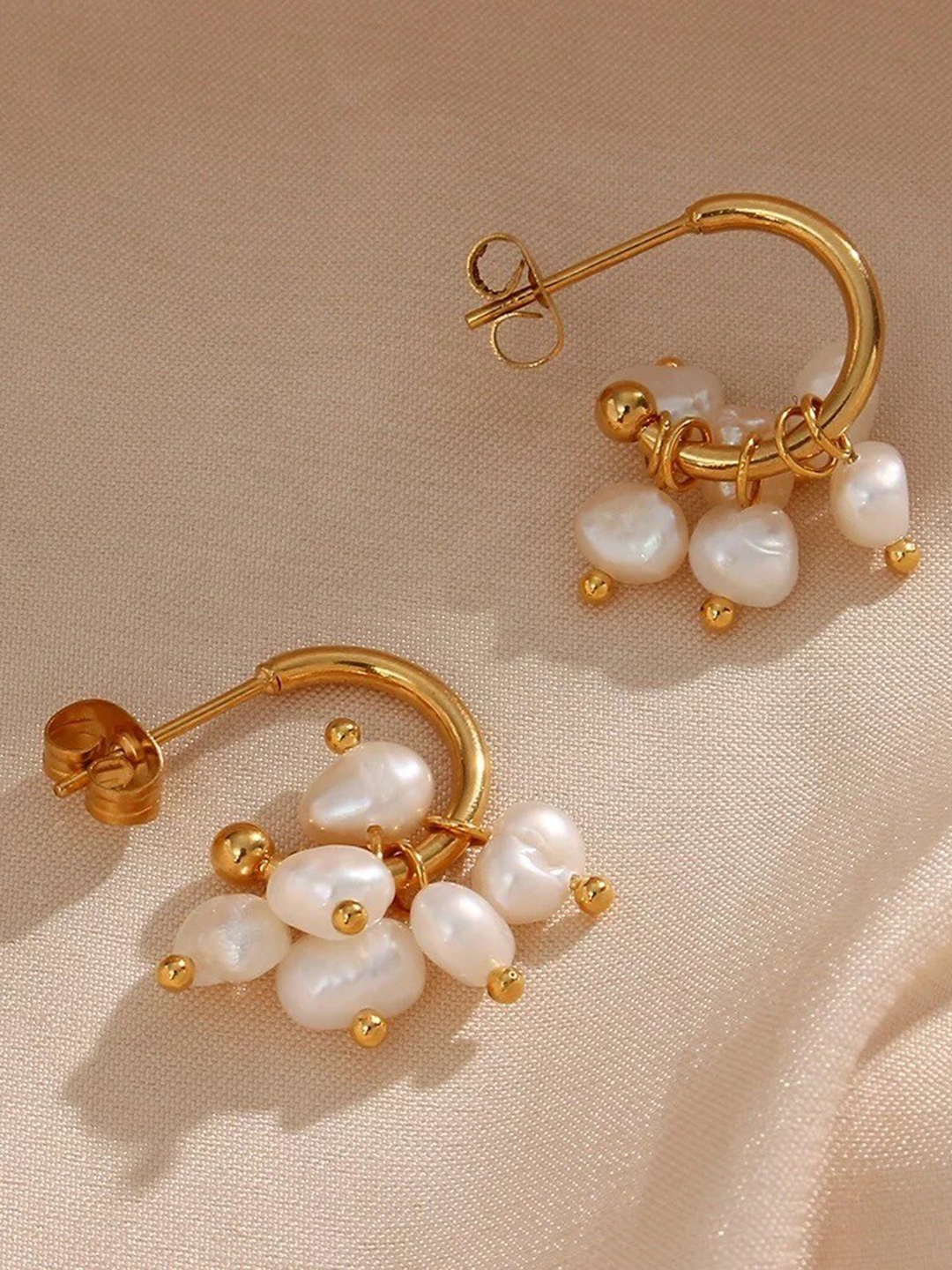 

Inaya White 18 kt Gold Plated Contemporary Hoop Earrings