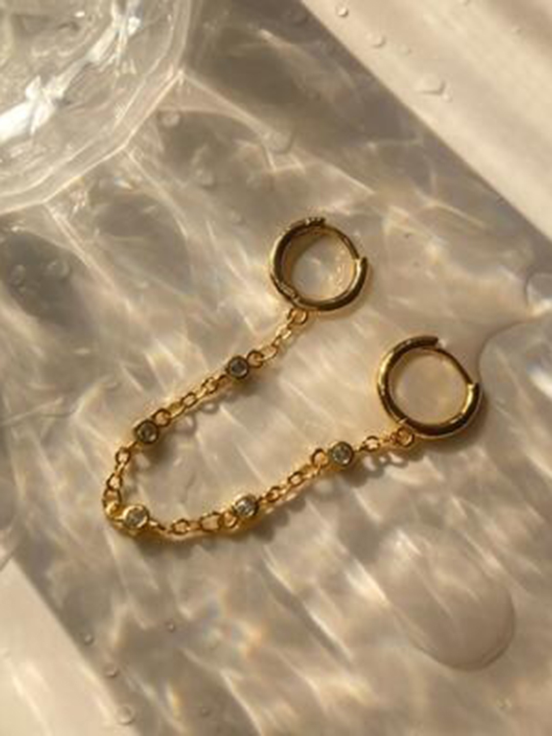 

Inaya Gold-Toned Stainless Steel Contemporary Western Style Single Hoop Earring