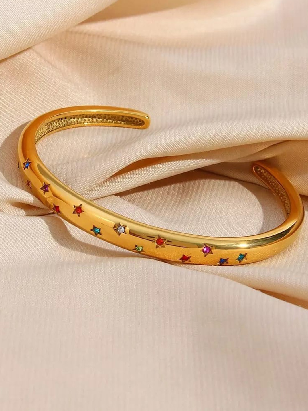 

Inaya Women Gold-Toned & Red Cubic Zirconia Gold-Plated Kada Bracelet