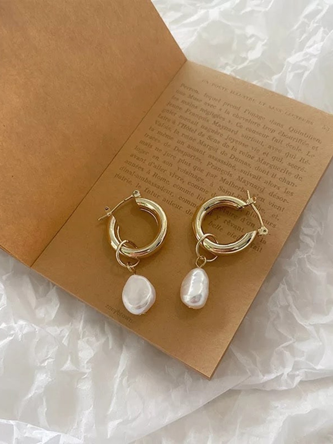 

Inaya Women Gold Plated White Contemporary Hoop Earrings