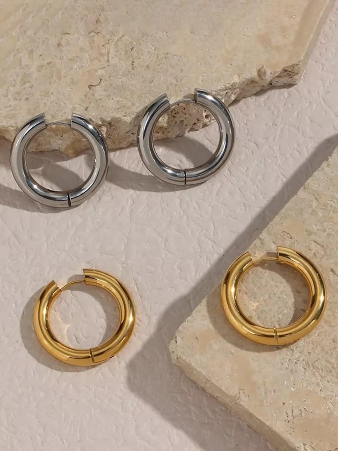 

Inaya Women Gold Plated Contemporary Hoop Earrings