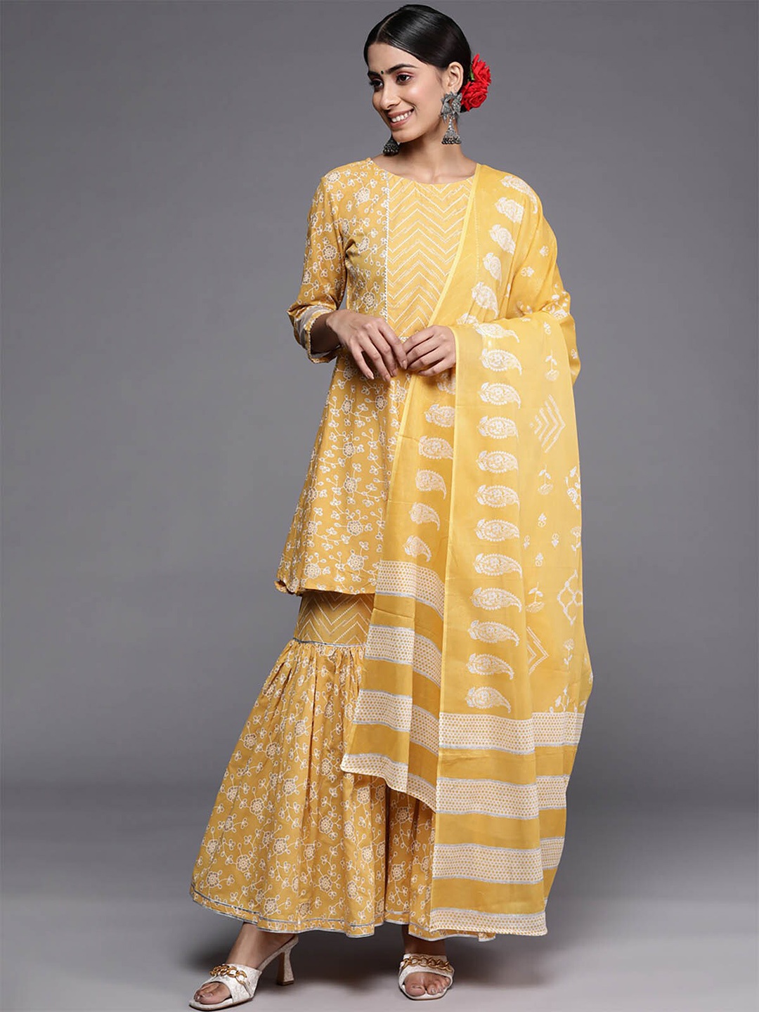 

ODETTE Women Yellow Floral Printed Gotta Patti Kurta with Sharara & With Dupatta