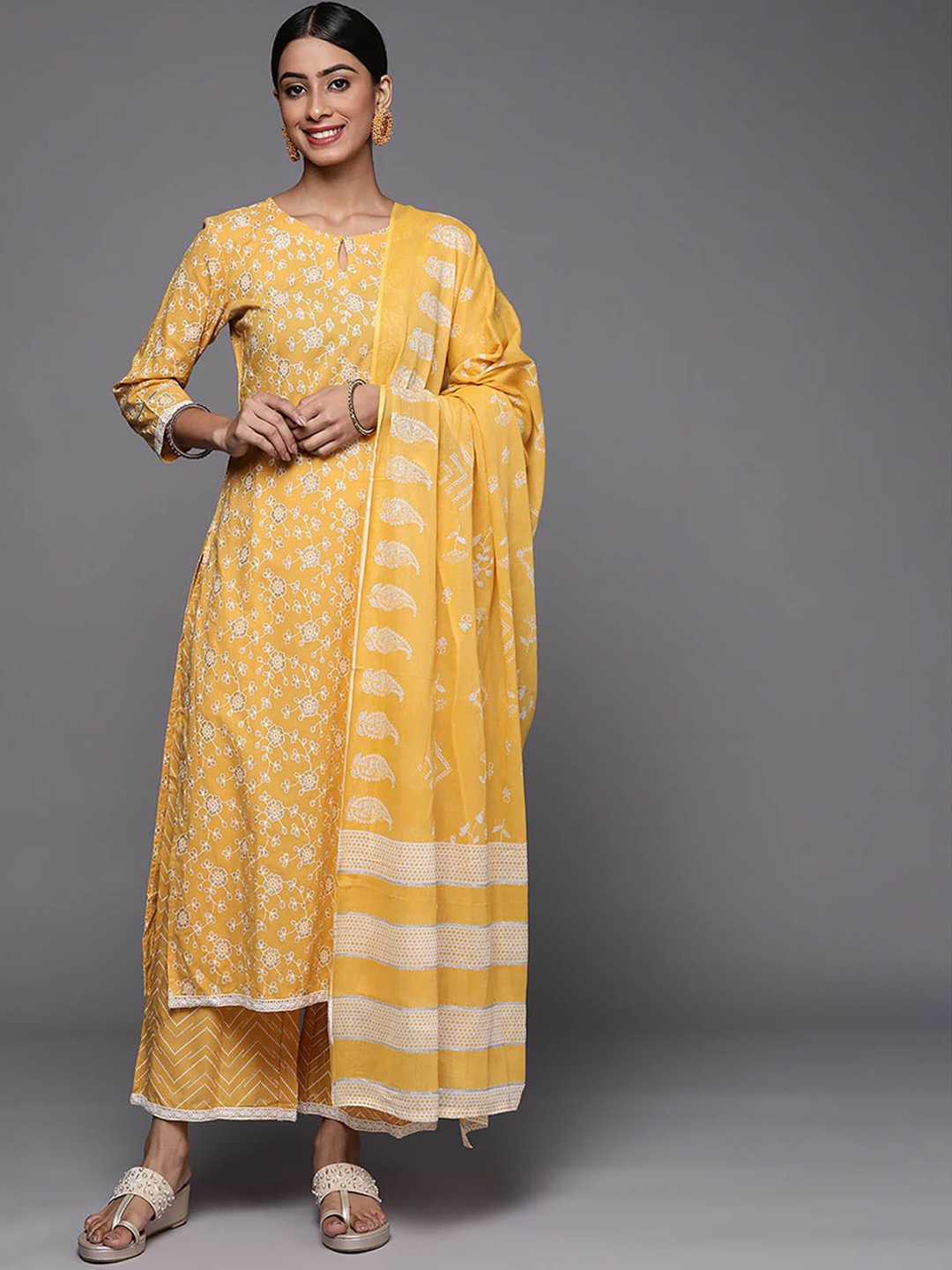 

ODETTE Women Yellow Floral Printed Kurta with Palazzos & With Dupatta