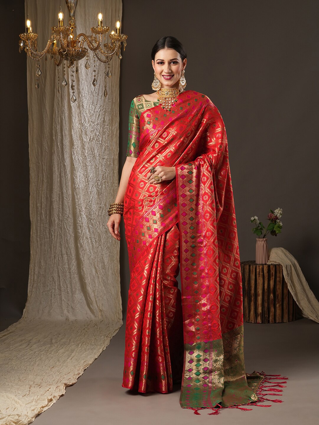 

Mitera Red & Green Woven Design Zari Silk Blend Patola Saree