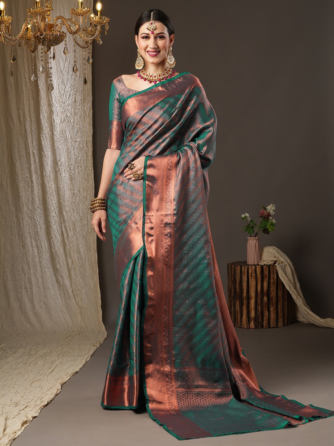 

Saree mall Teal Blue & Copper-Toned Woven Design Zari Silk Blend Kanjeevaram Sarees