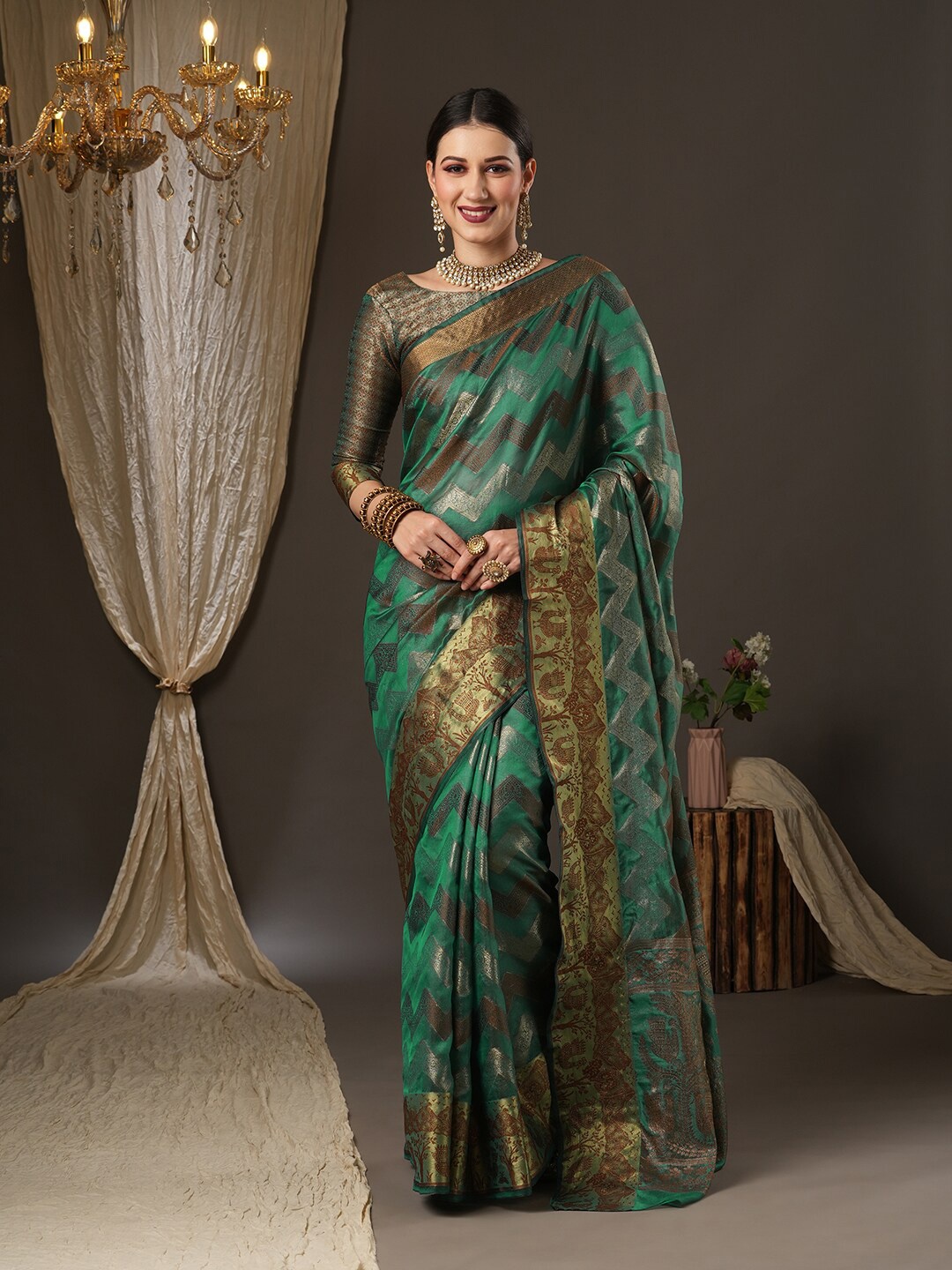 

Saree mall Teal & Gold-Toned Woven Design Zari Silk Blend Bagru Sarees