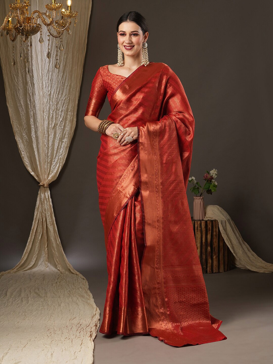 

Saree mall Red & Copper-Toned Woven Design Zari Silk Blend Kanjeevaram Sarees