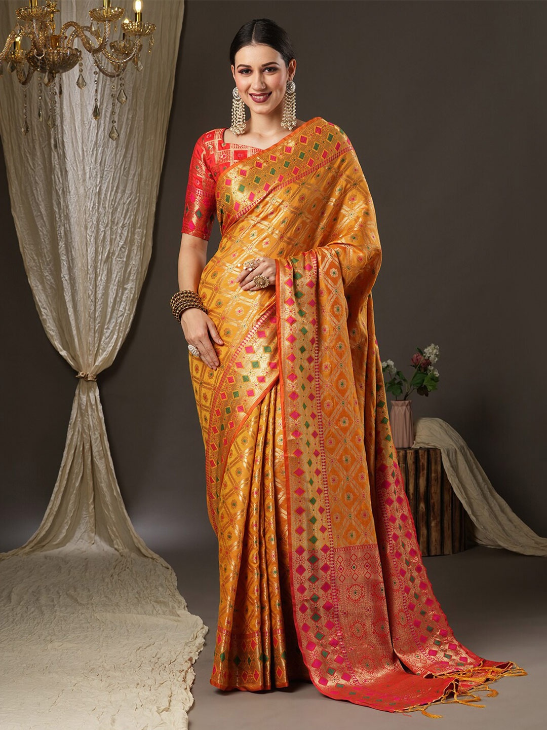 

Saree mall Mustard & Green Woven Design Zari Silk Blend Patola Sarees