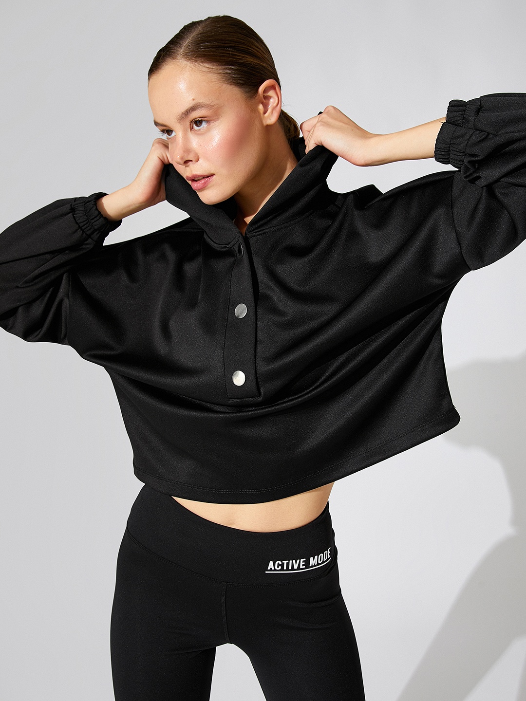 

Koton Women Black Hooded Satin Finish Sweatshirt