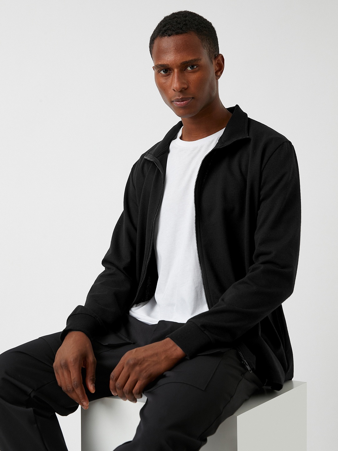 

Koton Men Solid Zipped Stand Neck Sweatshirt, Black