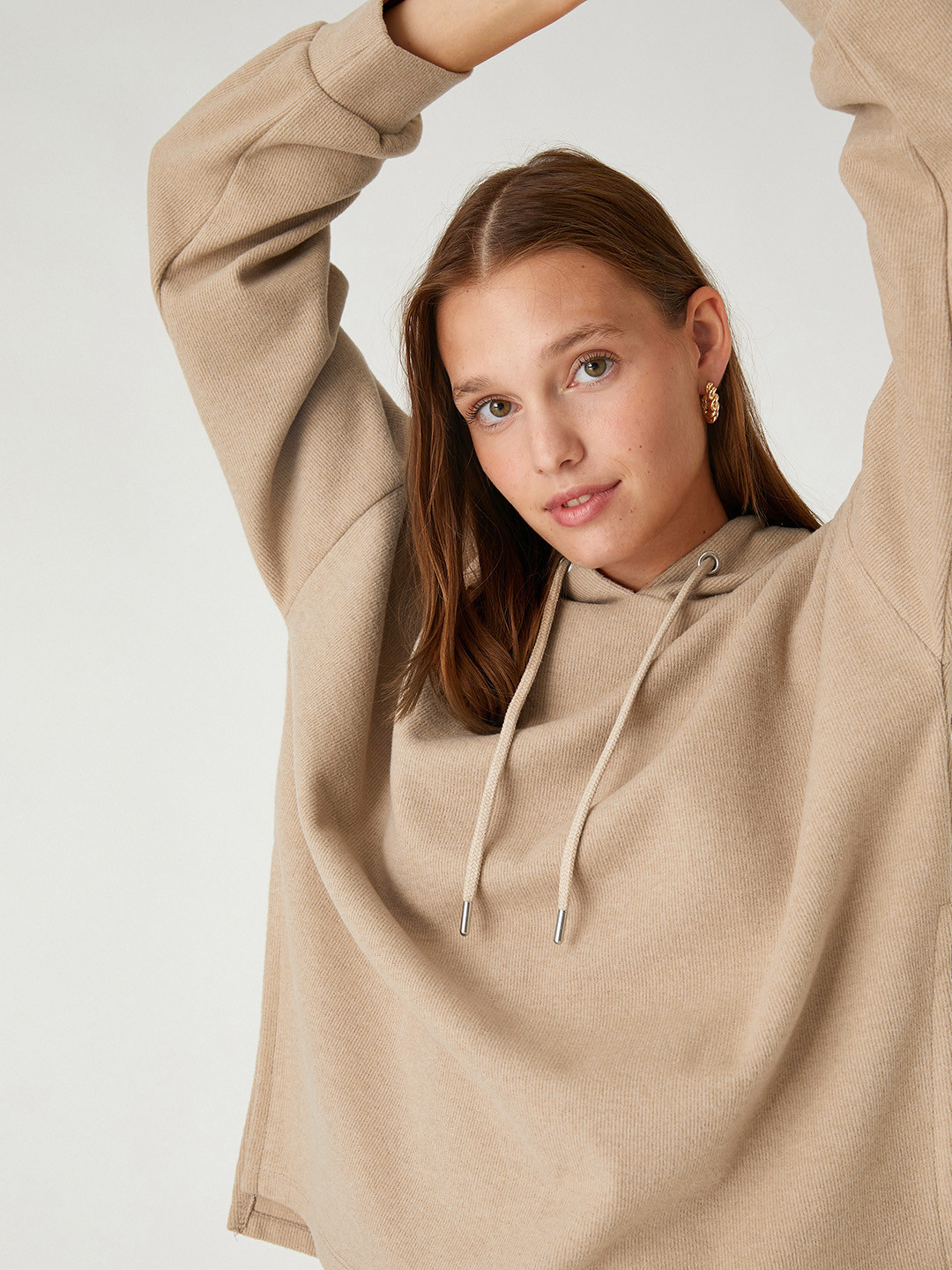 

Koton Women Beige Solid Hooded Sweatshirt