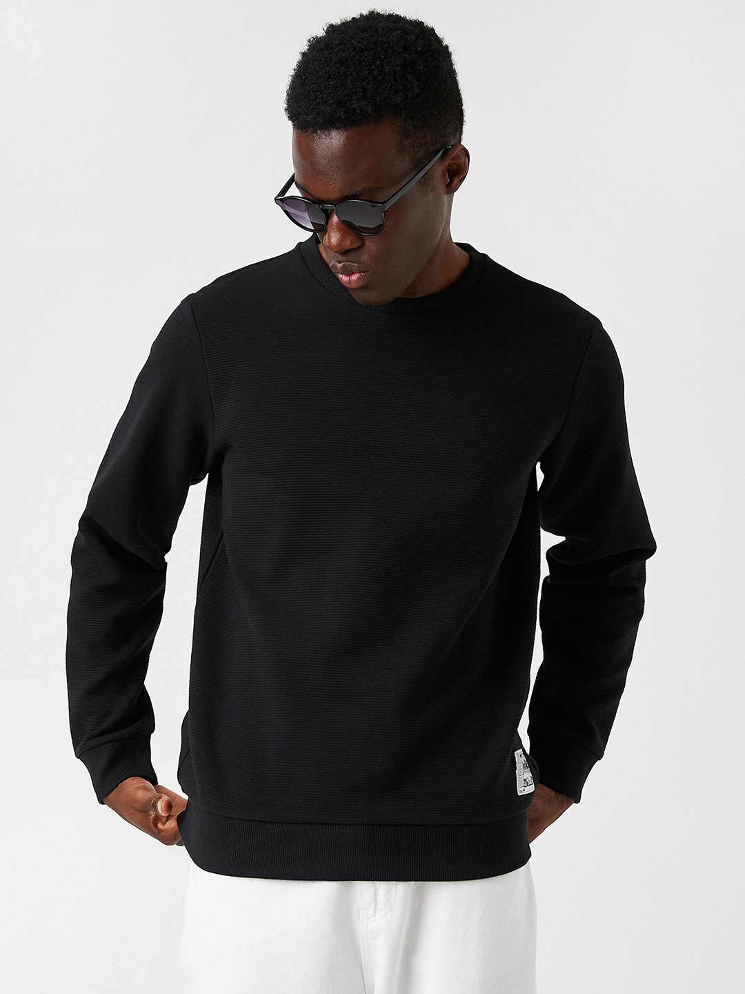 

Koton Men Black Solid Sweatshirt