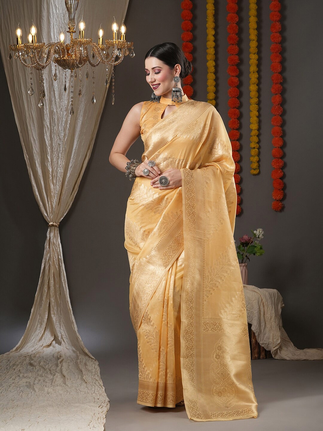 

Mitera Yellow & Gold-Toned Woven Design Zari Organza Chanderi Saree