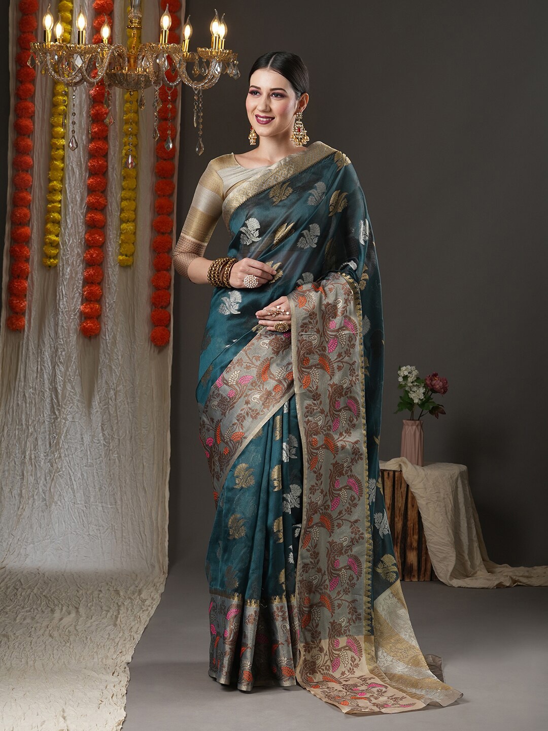

Mitera Teal Blue & Gold-Toned Floral Zari Organza Saree