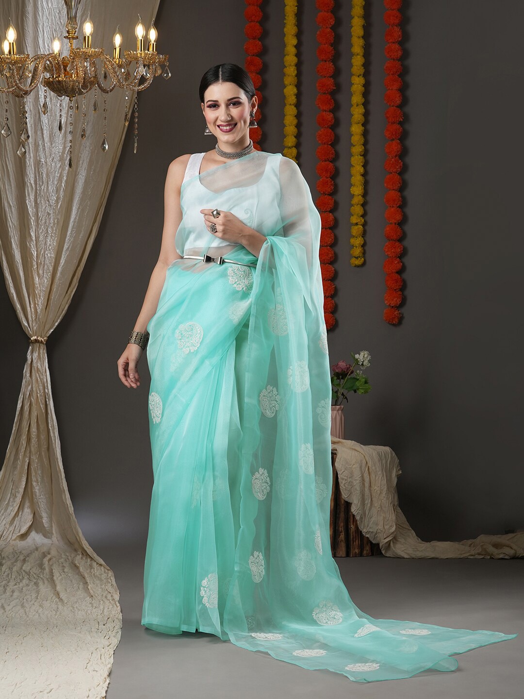 

Saree mall Turquoise Blue & White Ethnic Motifs Organza Banarasi Sarees