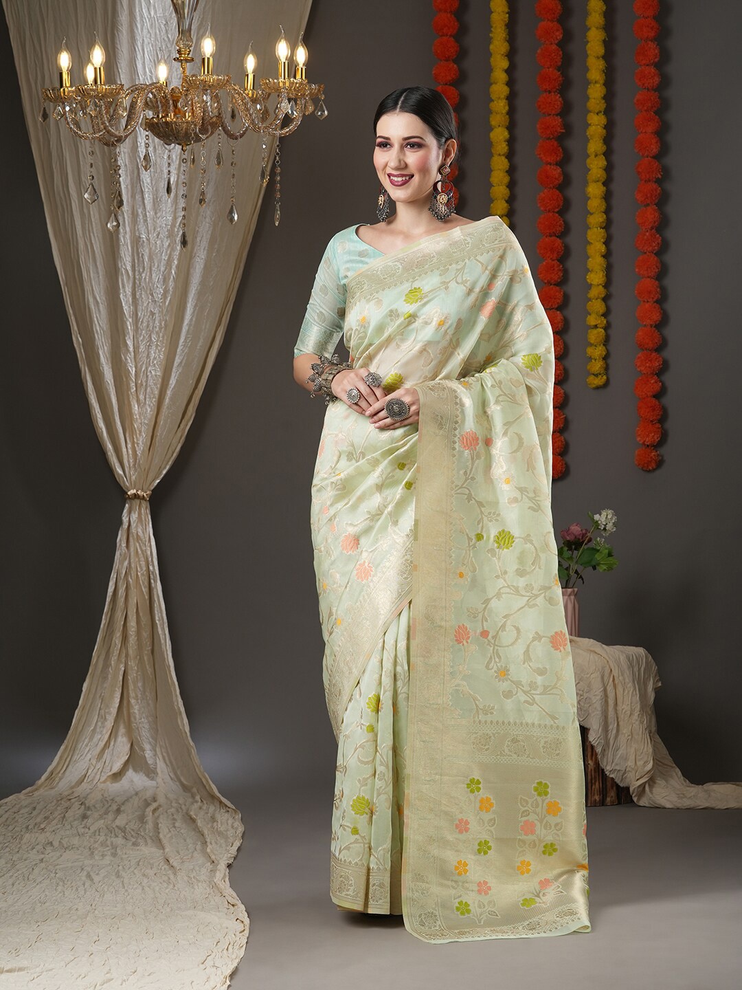 

Saree mall Sea Green Floral Zari Organza Chanderi Sarees