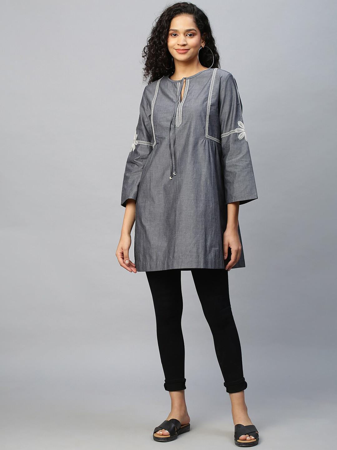 

Modern Indian by CHEMISTRY Charcoal Flared Sleeves Thread Work Pure Cotton Thread Work Short Kurti