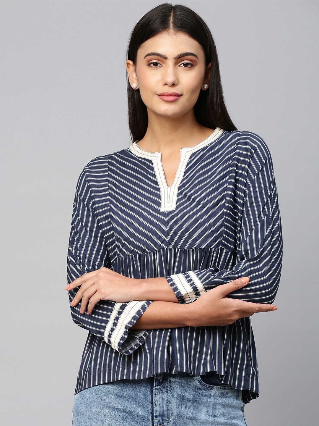 

Chemistry Navy Blue Striped Empire Top