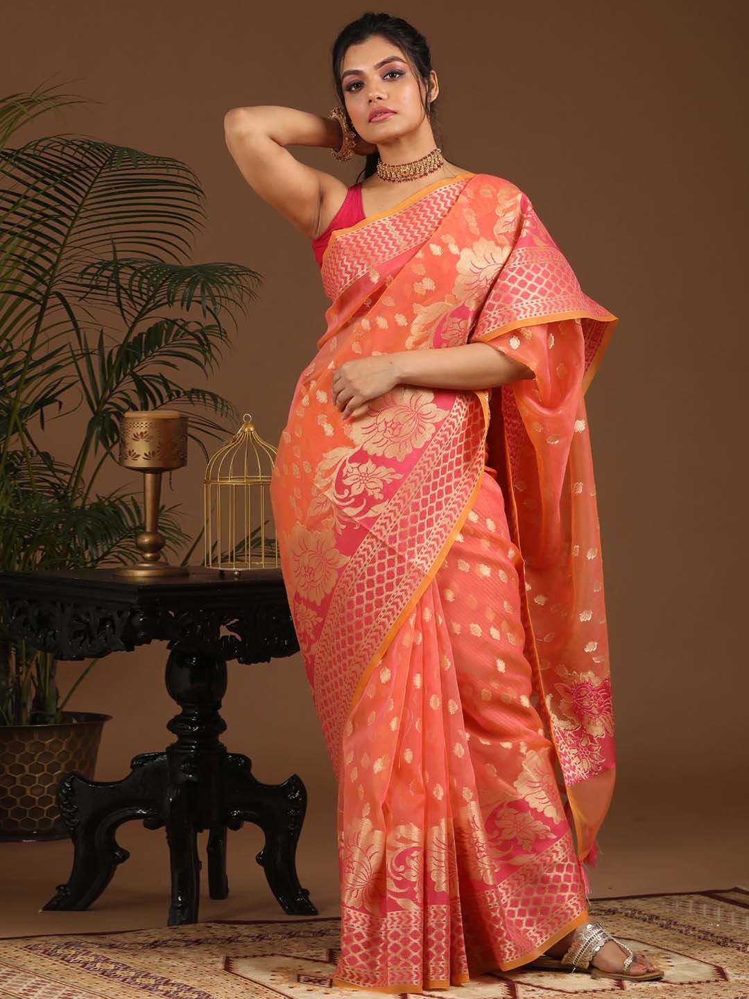 

Saranee Orange & Gold-Toned Ethnic Motifs Zari Art Silk Banarasi Saree