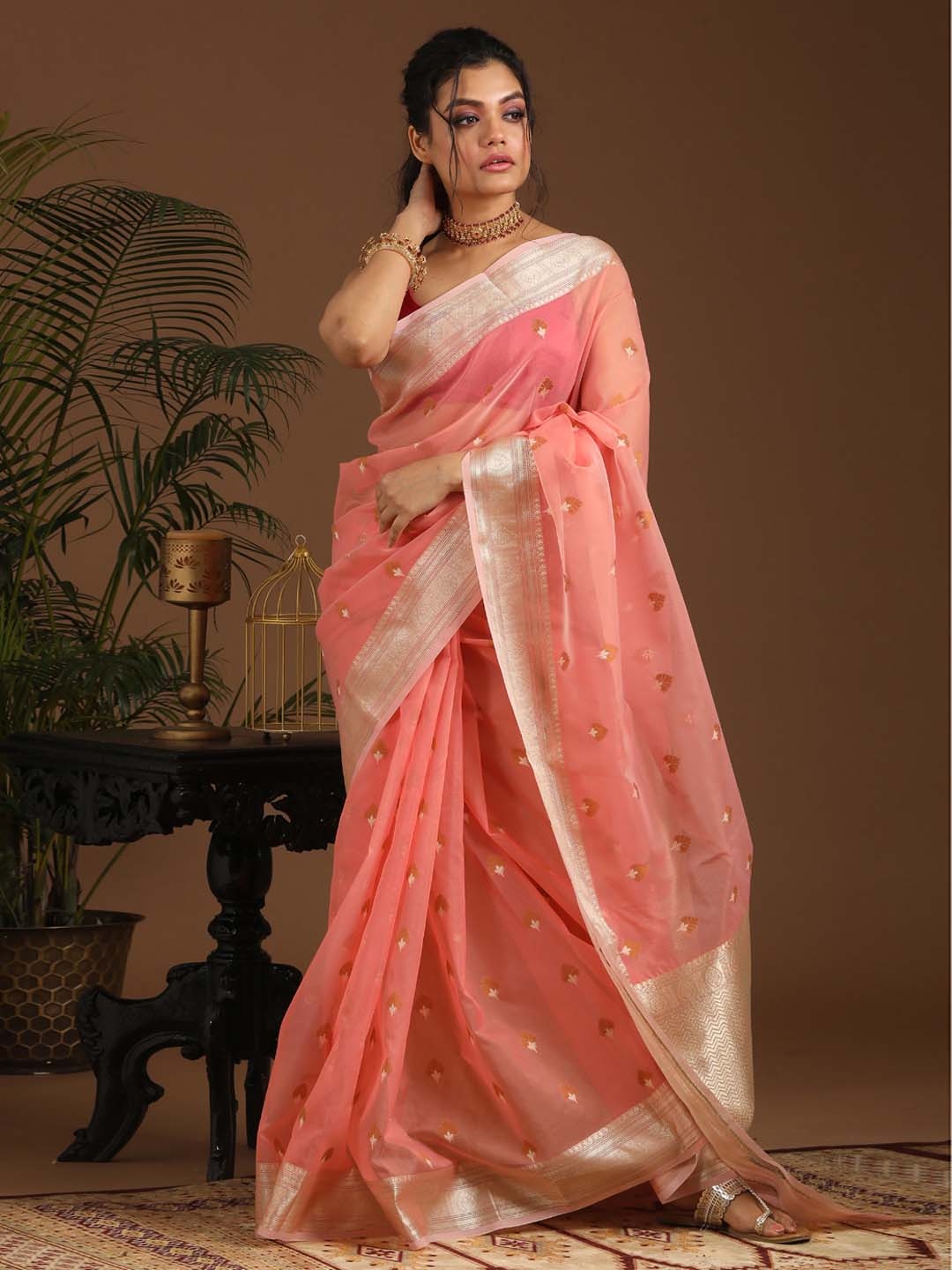 

Indethnic Pink & Gold-Toned Ethnic Motifs Zari Art Silk Banarasi Saree