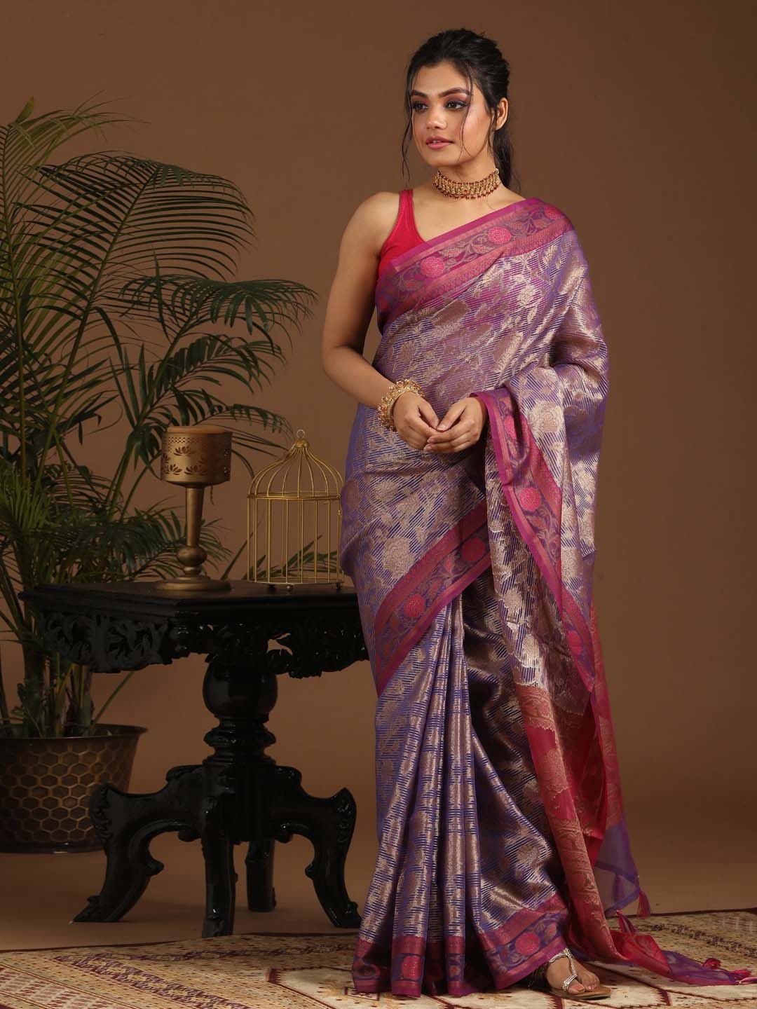 

Indethnic Purple & Violet Ethnic Motifs Zari Art Silk Banarasi Saree