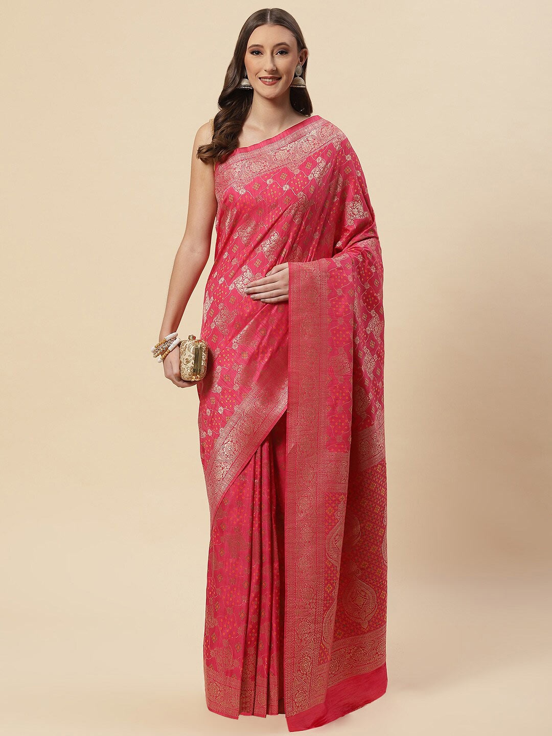 

Meena Bazaar Pink & Gold-Toned Ethnic Motifs Zari Art Silk Saree