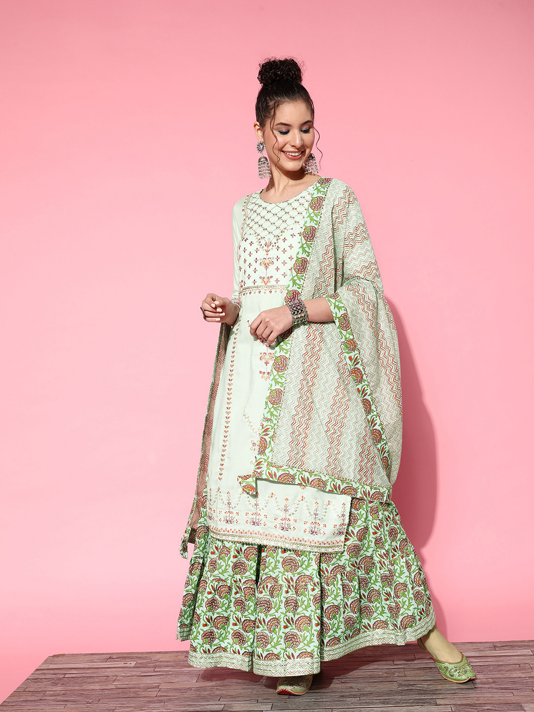 

Ishin Women Sea Green Floral Embroidered Kurta with Sharara & With Dupatta