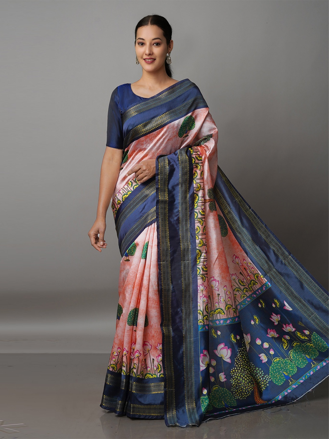 

Unnati Silks Orange & Blue Kalamkari Zari Silk Blend Kanjeevaram Saree