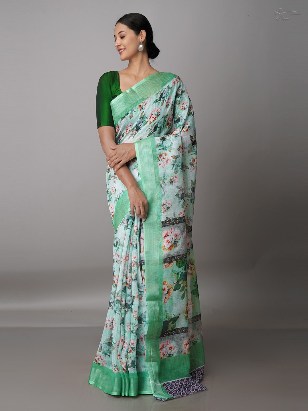 

Unnati Silks Green & Grey Floral Linen Blend Jamdani Saree