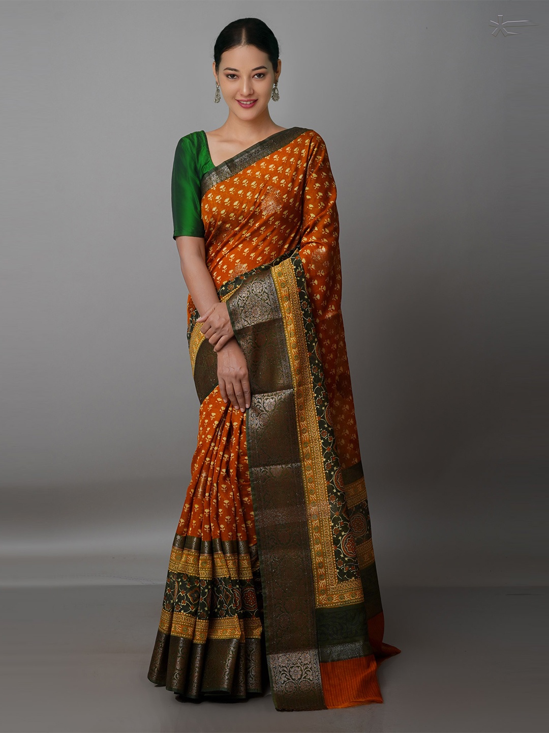 

Unnati Silks Orange & Green Zari Silk Cotton Maheshwari Saree
