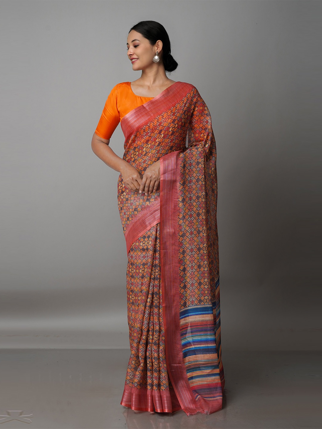 

Unnati Silks Orange & Grey Linen Blend Jamdani Saree