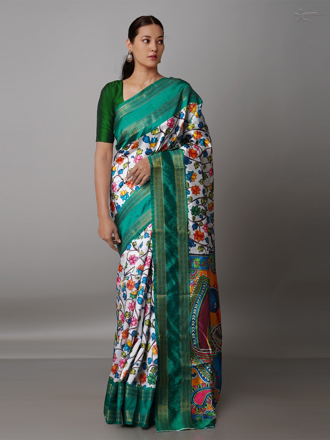 

Unnati Silks White & Green Kalamkari Zari Silk Blend Kanjeevaram Saree