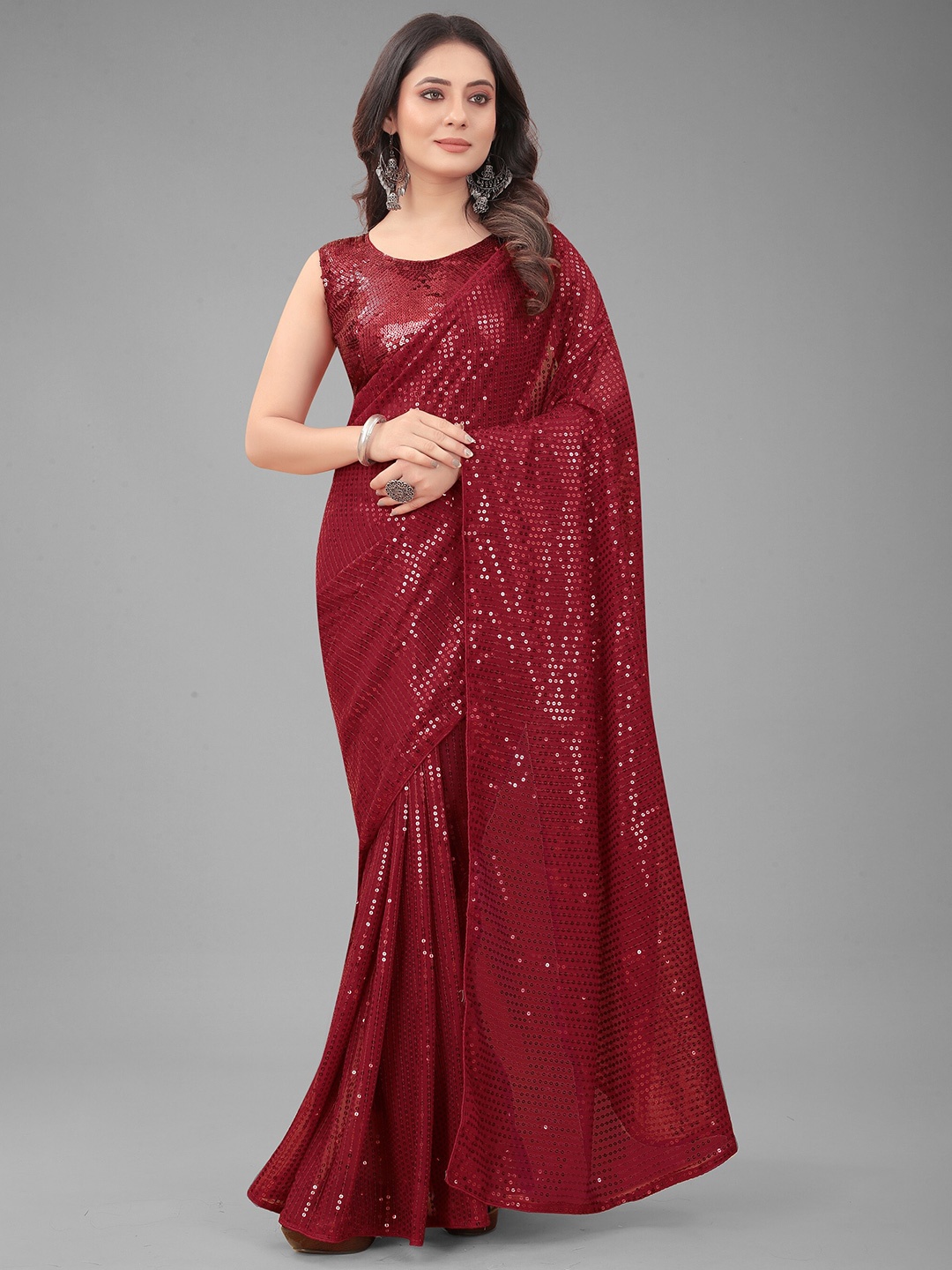 

Nityanta Fab Red Embellished Sequinned Ikat Saree