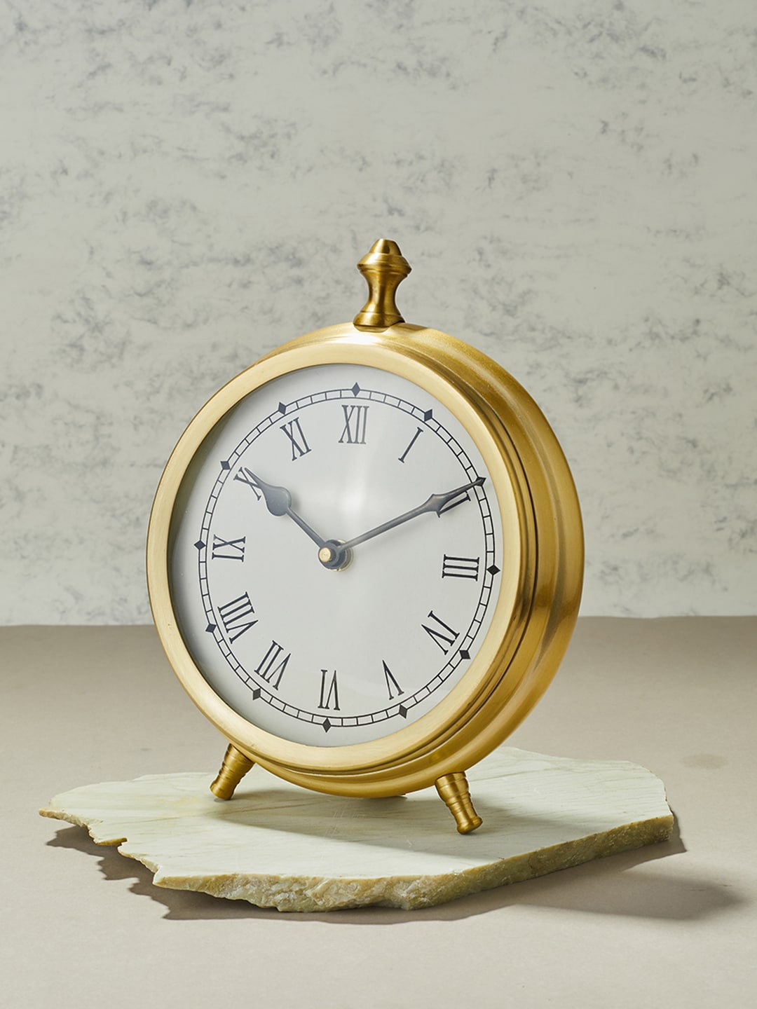 

Fabindia Gold-Toned & White Contemporary Table Clock