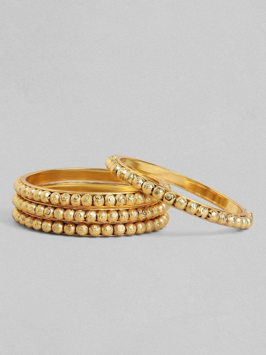 

Jewar Mandi Set Of 4 Gold-Plated Round Ball Gokhru Design Bangle Set