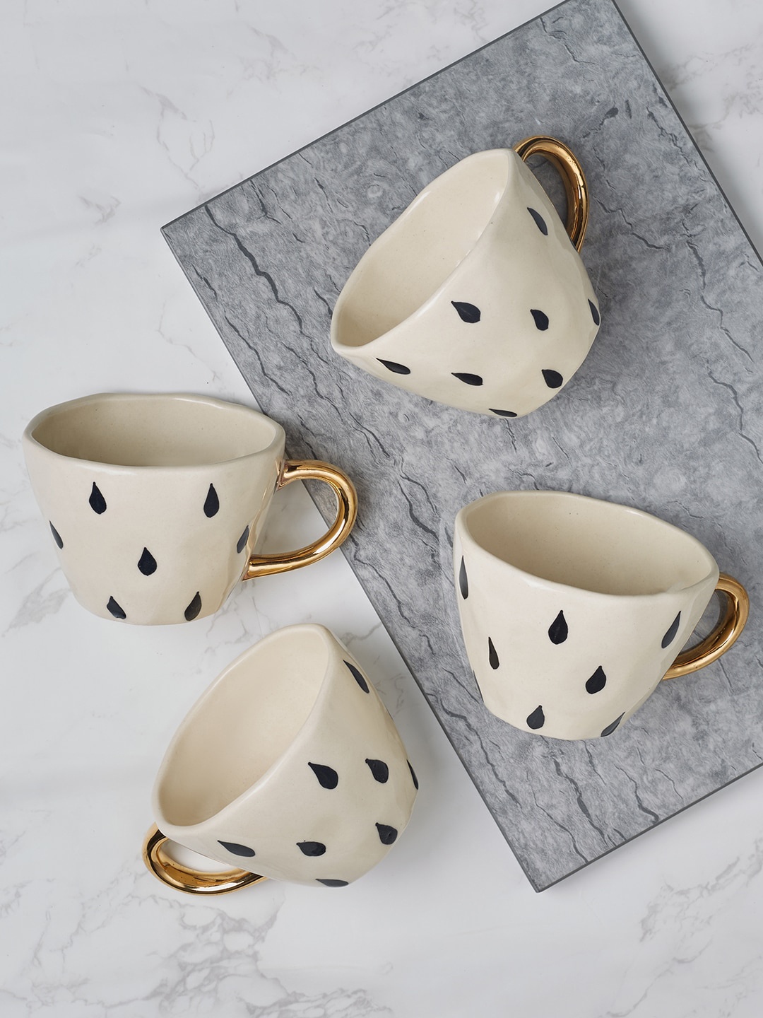 

HomeTown Fiesta Studio Pottery Droplet White & Black Set of 4 Printed Ceramic Mugs