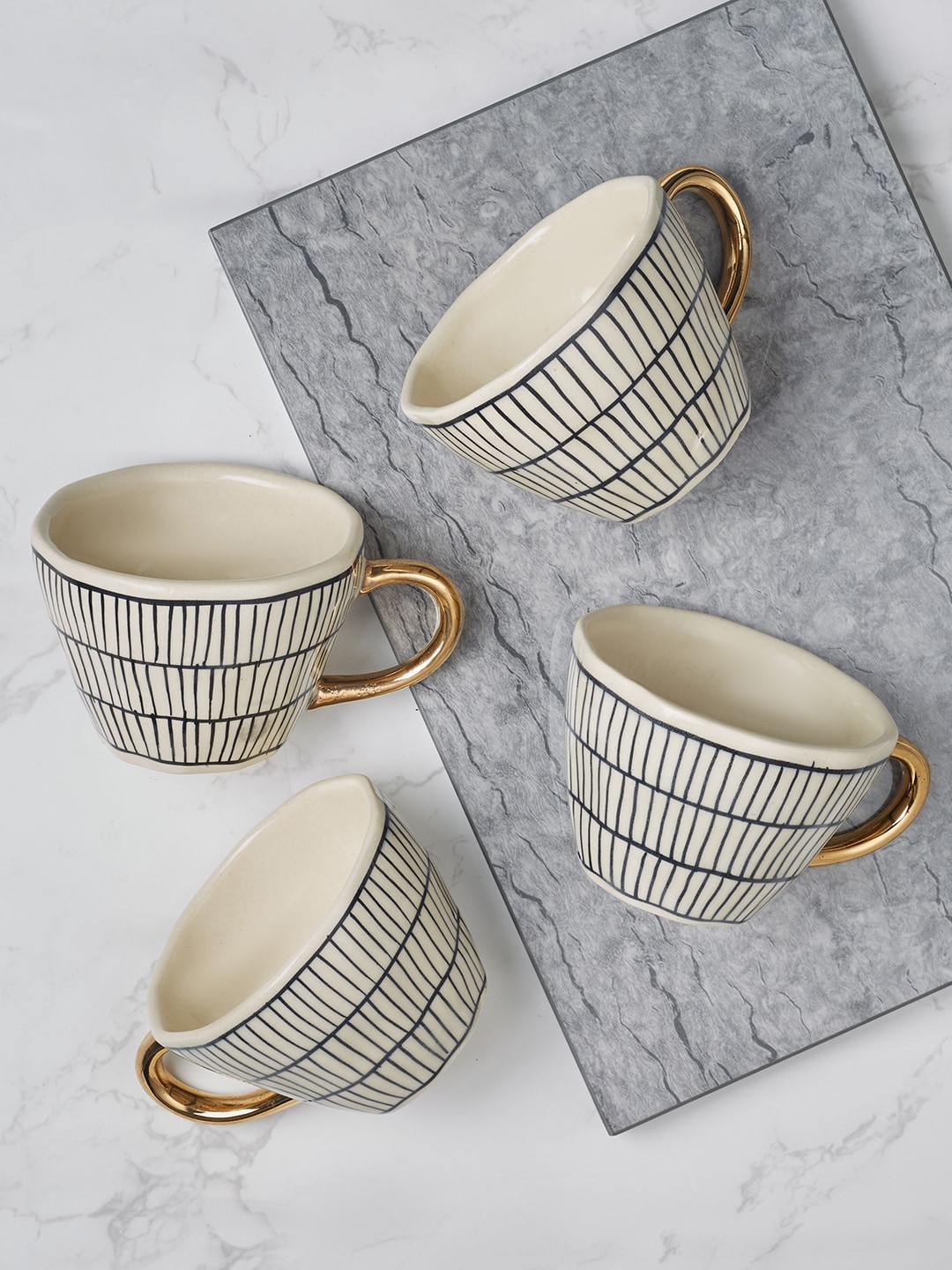 

HomeTown Fiesta Studio Pottery Linar Black & White Set Of 4 mugs
