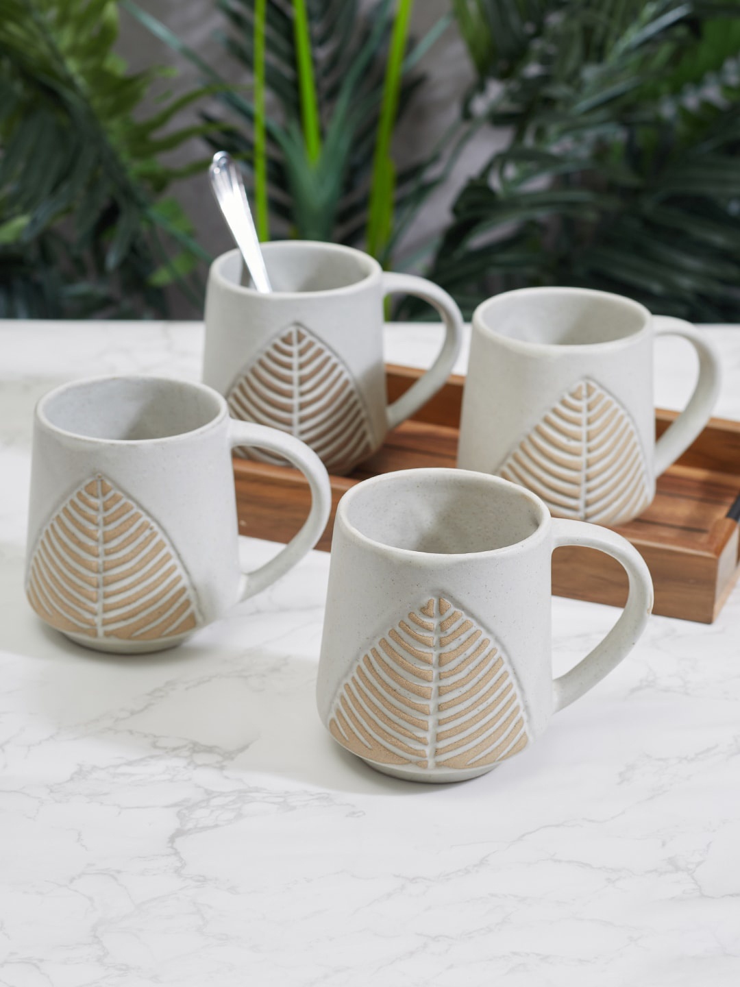 

HomeTown iesta Studio Pottery Ojas White & Beige Set of 4 Ceramic Printed Mugs