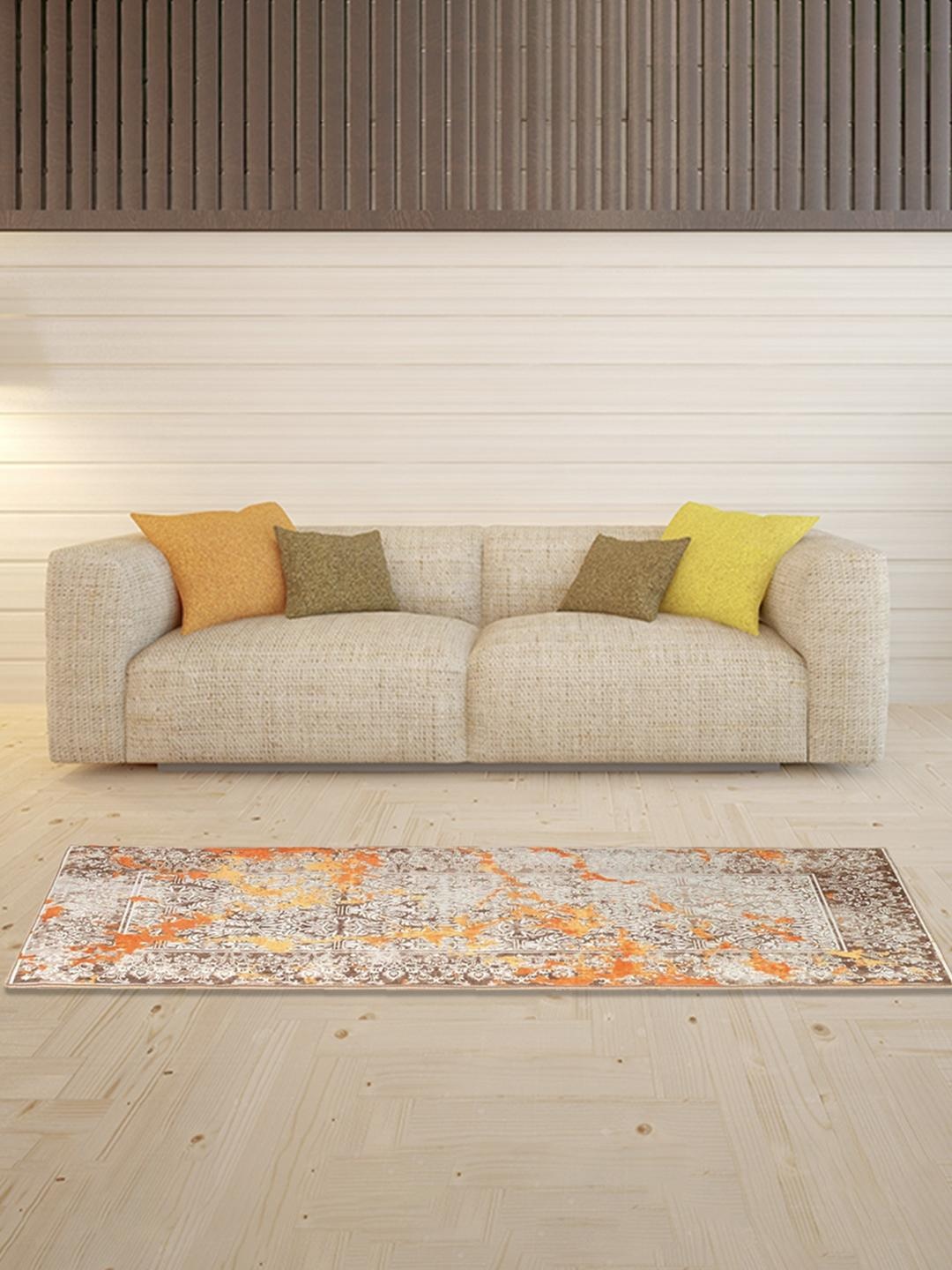 

Athome by Nilkamal Grey & Orange Ethnic Motif Patterned Anti-Skid Polyester Carpets