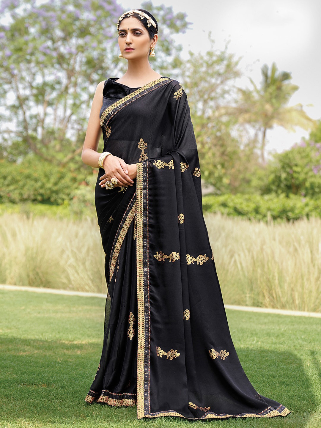 

Mitera Black & Gold-Toned Ethnic Motifs Beads and Stones Pure Chiffon Bagru Saree