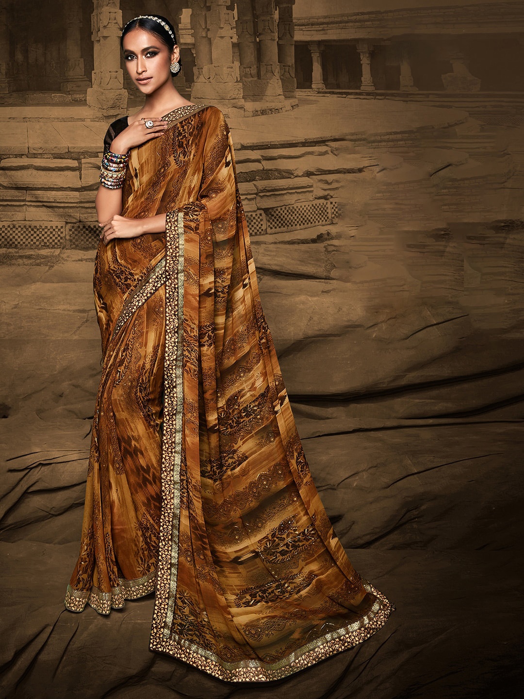 

Mitera Brown & Gold-Toned Floral Silk Blend Bagh Saree