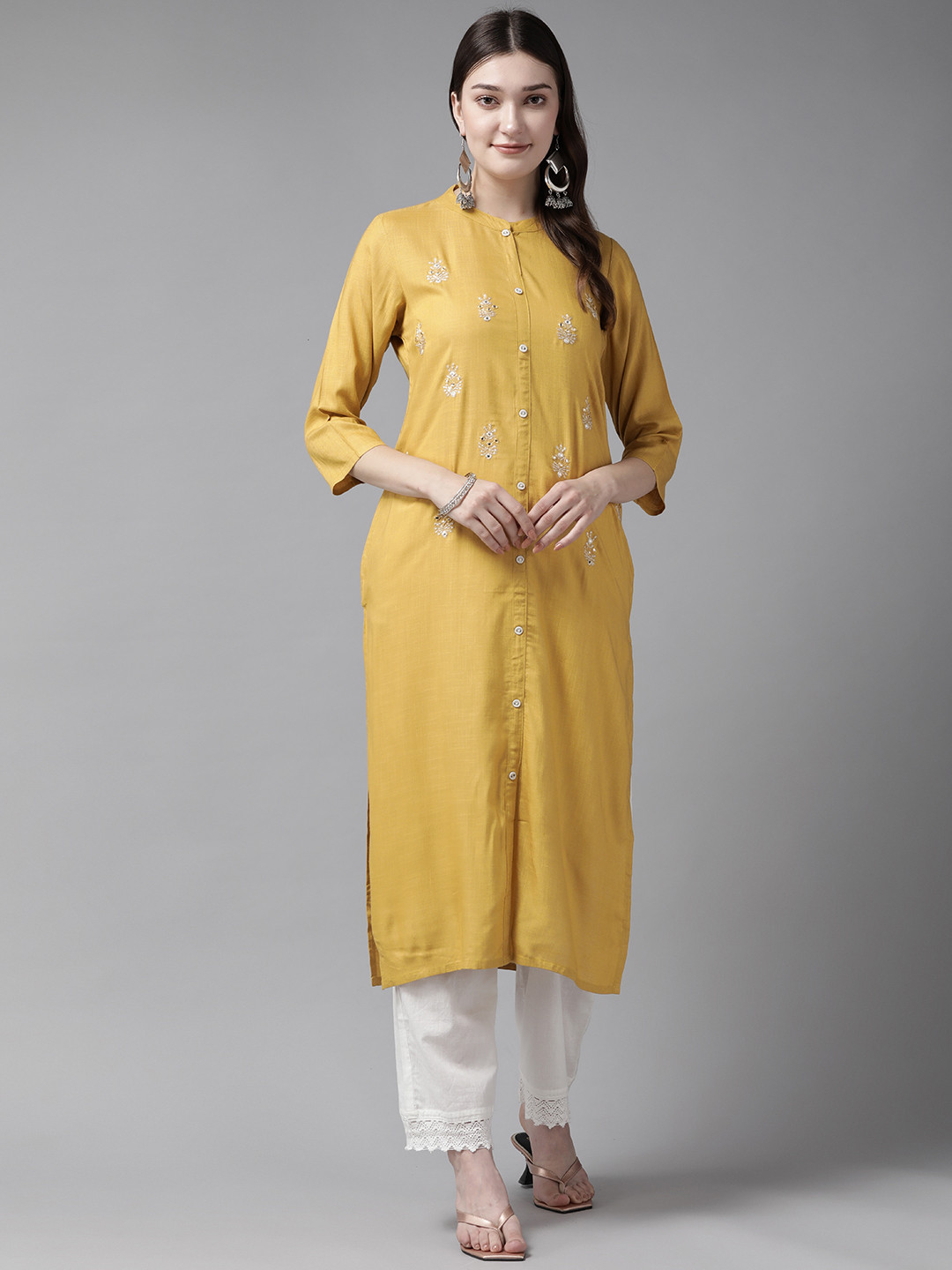 

Prakrti Women Ethnic Motifs Embroidered Mirror Work Kurta, Mustard